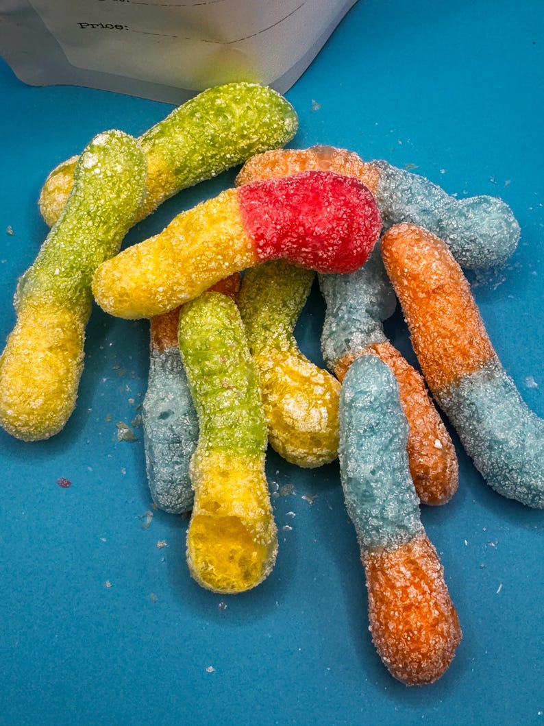 Freeze dried sour gummy worms treat snack candy puff