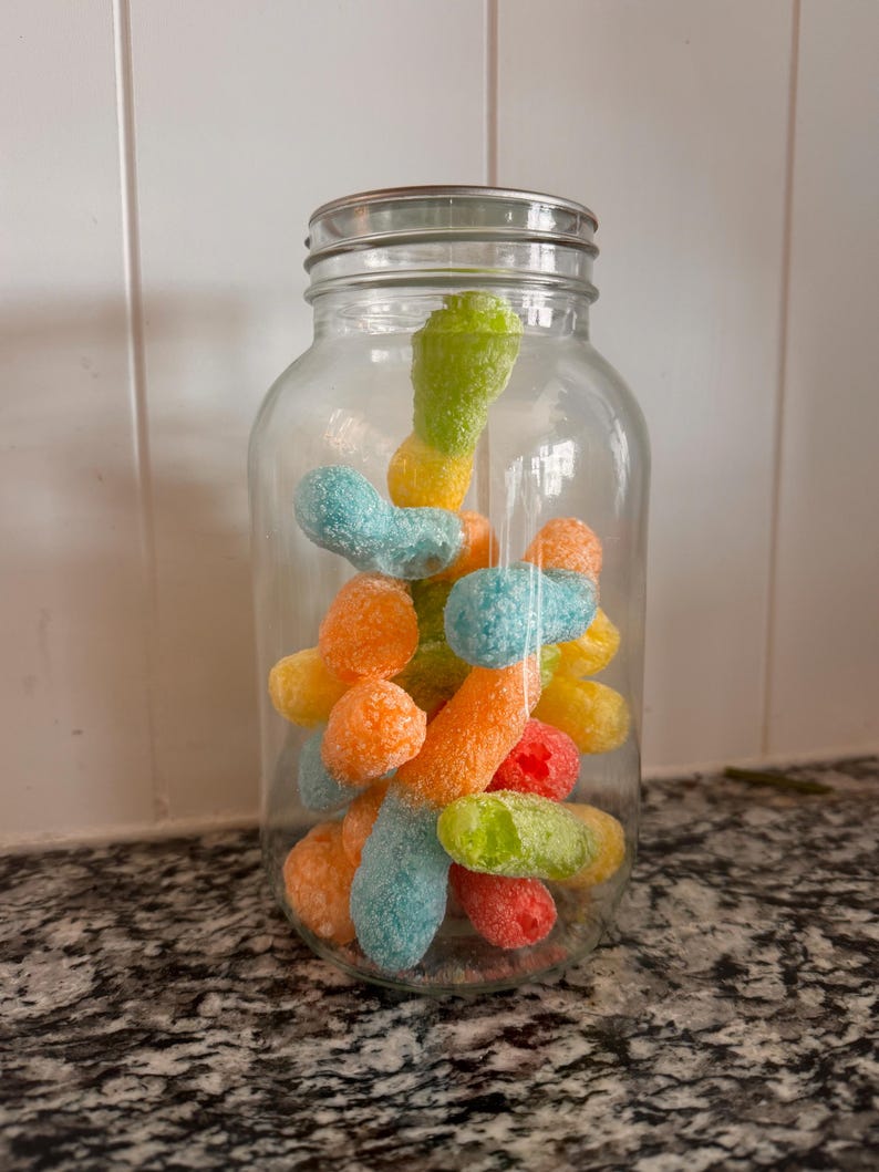 Freeze dried sour gummy worms treat snack candy puff